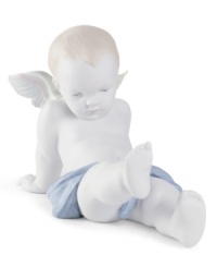 What an angel. Crafted in exquisite porcelain with delicate, muted hues, this baby boy figurine is heaven sent for Lladro collectors. What an angel. Crafted in exquisite porcelain with delicate, muted hues, this baby boy figurine is heaven sent for Lladro collectors.