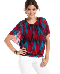 Give some worldly flair to your spring wardrobe with INC's petite top, featuring an exotic print and a flirty fit. Give some worldly flair to your spring wardrobe with INC's petite top, featuring an exotic print and a flirty fit.