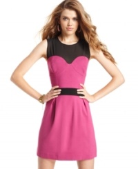 Dark accents compliment the structured design of this colorblocked party dress from Jessica Simpson! Dark accents compliment the structured design of this colorblocked party dress from Jessica Simpson!