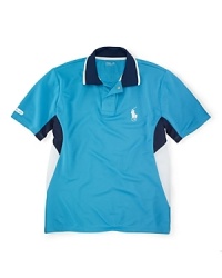 Bold color-blocking accents an athletic polo shirt, crafted from ultra-breathable mesh microfiber with perforated side panels for additional comfort. Bold color-blocking accents an athletic polo shirt, crafted from ultra-breathable mesh microfiber with perforated side panels for additional comfort.