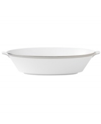 Timeless in white bone china, this Wedgwood vegetable bowl is adorned with a band of flecked pewter and precious platinum trim. Pair with the pale blue florals of Patina Platinum dinnerware. Timeless in white bone china, this Wedgwood vegetable bowl is adorned with a band of flecked pewter and precious platinum trim. Pair with the pale blue florals of Patina Platinum dinnerware.