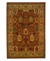 Intricately designed in warm red and gold tones with rich, dark accents, this stately rug adds distinguished decoration to both casual and formal rooms in your home. Soft nylon fabric is cross-woven for exceptional durability. Intricately designed in warm red and gold tones with rich, dark accents, this stately rug adds distinguished decoration to both casual and formal rooms in your home. Soft nylon fabric is cross-woven for exceptional durability.