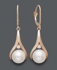 Take any look up a level when you add these sophisticated drop earrings. Cultured freshwater pearls (8-1/2 mm) add polish, while round-cut diamond accents add sparkle. Crafted in 14k rose gold. Approximate drop: 1-1/4 inches.