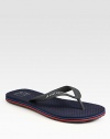 Rubber thong sandal with logo detail.Rubber upperPadded insoleRubber soleMade in Italy
