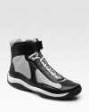 Leather and mesh with hook-and-tab ankle closure. Padded insole Rubber sole Imported 