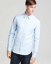 Burberry Brit perfects the art of the sport shirt with this tailored, solid style. Burberry Brit perfects the art of the sport shirt with this tailored, solid style.
