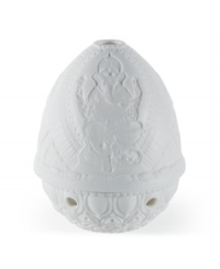 Honor Lord Ganesha with this delicately etched lithopane figurine and votive holder from Lladro. Place a candle inside to bring all of the incredible detail to light. Honor Lord Ganesha with this delicately etched lithopane figurine and votive holder from Lladro. Place a candle inside to bring all of the incredible detail to light.