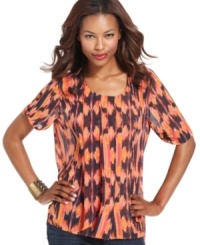 Wake up your wardrobe with a chic pleated blouse from W118 by Walter Baker. The colorful print works with everything from your favorite jeans to a tailored skirt and heels. (Clearance) Wake up your wardrobe with a chic pleated blouse from W118 by Walter Baker. The colorful print works with everything from your favorite jeans to a tailored skirt and heels. (Clearance)
