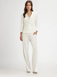 Incredibly lightweight in a double-breasted silhouette, closely cropped for a modern shape.Notched-collarDefined shouldersCuffed three-quarter sleevesDouble-breasted button frontWelt pocketsAbout 23 from shoulder to hem95% viscose/5% elastaneDry cleanMade in USA of Italian fabricModel shown is 5'10 (177cm) wearing US size 4. Incredibly lightweight in a double-breasted silhouette, closely cropped for a modern shape.Notched-collarDefined shouldersCuffed three-quarter sleevesDouble-breasted button frontWelt pocketsAbout 23 from shoulder to hem95% viscose/5% elastaneDry cleanMade in USA of Italian fabricModel shown is 5'10 (177cm) wearing US size 4.