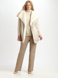 Top off virtually any outfit with this cozy-chic style with a drawstring detail to define your waist.Snap button closureDrawstring waistSlash pocketsAbout 38 from shoulder to hem80% polyester/20% nylonDry cleanImported Top off virtually any outfit with this cozy-chic style with a drawstring detail to define your waist.Snap button closureDrawstring waistSlash pocketsAbout 38 from shoulder to hem80% polyester/20% nylonDry cleanImported