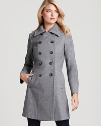 Ribbed knit neckline detail lends texture and ease to this DKNY coat--a modern twist on the perennial, double-breasted silhouette. Ribbed knit neckline detail lends texture and ease to this DKNY coat--a modern twist on the perennial, double-breasted silhouette.