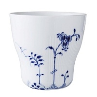 Showcasing a hand-painted blue-on-white floral pattern that's embellished with bold geometric motifs, Royal Copenhagen's Blue Elements cup artfully embodies traditional style with a nod towards modernity. Showcasing a hand-painted blue-on-white floral pattern that's embellished with bold geometric motifs, Royal Copenhagen's Blue Elements cup artfully embodies traditional style with a nod towards modernity.