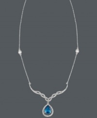 Your neckline has never looked so luxurious! B. Brilliant's beautiful teardrop-shaped pendant features a swirling design in white and London blue cubic zirconias (7-1/3 ct. t.w.). Set in sterling silver. Approximate length: 18 inches. Approximate drop: 1/2 inch. Your neckline has never looked so luxurious! B. Brilliant's beautiful teardrop-shaped pendant features a swirling design in white and London blue cubic zirconias (7-1/3 ct. t.w.). Set in sterling silver. Approximate length: 18 inches. Approximate drop: 1/2 inch.