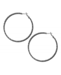 Traditional hoops with designer appeal. Alfani earrings feature a hematite tone hoop setting with a chic, textured finish. Approximate diameter: 2-1/8 inches. Traditional hoops with designer appeal. Alfani earrings feature a hematite tone hoop setting with a chic, textured finish. Approximate diameter: 2-1/8 inches.