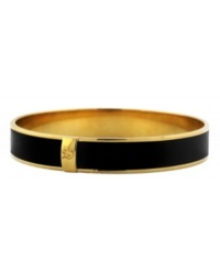Everyone knows that black is a staple in every fashionista's wardrobe. This simple cuff bracelet design by Vince Camuto is no exception. A black patent leather strip makes this versatile bangle a must-have for your collection. Crafted in gold tone mixed metal. Approximate diameter: 3 inches. Everyone knows that black is a staple in every fashionista's wardrobe. This simple cuff bracelet design by Vince Camuto is no exception. A black patent leather strip makes this versatile bangle a must-have for your collection. Crafted in gold tone mixed metal. Approximate diameter: 3 inches.