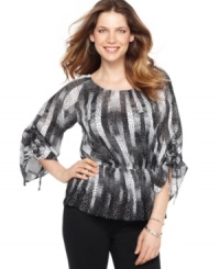 Style&co.'s petite top features a bold print and a stylish silhouette--pair with slim-fitting pants and your favorite heels for a great evening-out ensemble! (Clearance) Style&co.'s petite top features a bold print and a stylish silhouette--pair with slim-fitting pants and your favorite heels for a great evening-out ensemble! (Clearance)