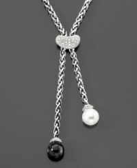 A classic contrast of black and white dangles from this elegant diamond (1/5 ct. t.w.) necklace. With one freshwater pearl (9-9.5mm) and one onyx stone (9-9.5mm). 18 sterling silver chain. A classic contrast of black and white dangles from this elegant diamond (1/5 ct. t.w.) necklace. With one freshwater pearl (9-9.5mm) and one onyx stone (9-9.5mm). 18 sterling silver chain.
