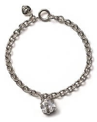 Juicy Couture's dainty silver charm bracelet is a piece you'll cherish for years to come. Juicy Couture's dainty silver charm bracelet is a piece you'll cherish for years to come.