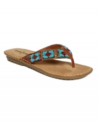 Bring easy Southwestern-inspired style to your summer looks with the colorful beading of the ultra-comfortable Marin thong sandals by Minnetonka. Bring easy Southwestern-inspired style to your summer looks with the colorful beading of the ultra-comfortable Marin thong sandals by Minnetonka.