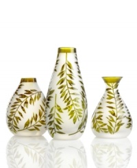 Silhouetted vines unfurl from a band of green on these softly frosted crystal vases, bringing a fresh hint of the outdoors in. Each simply curved shape is etched for earthy allure with or without a few blooms. Silhouetted vines unfurl from a band of green on these softly frosted crystal vases, bringing a fresh hint of the outdoors in. Each simply curved shape is etched for earthy allure with or without a few blooms.