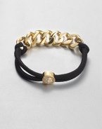 A combination of shiny metal and sporty elastic accented with a turn-lock logo bead. Goldtone-plated brassElasticLength, about 6.2Slip-on styleImported 