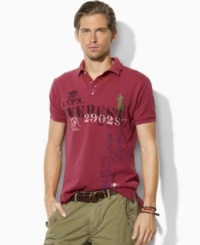 Crafted in a trim, modern fit from breathable cotton mesh, a short-sleeved polo shirt gets a bold update with an expedition-inspired graphic print. Crafted in a trim, modern fit from breathable cotton mesh, a short-sleeved polo shirt gets a bold update with an expedition-inspired graphic print.