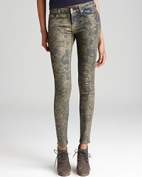A golden floral print lends gilded luxe to these 7 For All Mankind skinny jeans. A golden floral print lends gilded luxe to these 7 For All Mankind skinny jeans.