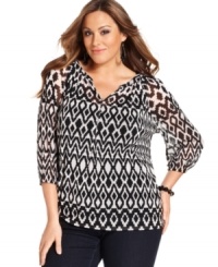 A graphic print ignites Alfani's three-quarter sleeve plus size top-- pair it with neutral bottoms for a polished casual look. A graphic print ignites Alfani's three-quarter sleeve plus size top-- pair it with neutral bottoms for a polished casual look.