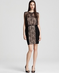 Accented with lace, this Aidan Mattox dress is a romantic choice for the party season. Accented with lace, this Aidan Mattox dress is a romantic choice for the party season.