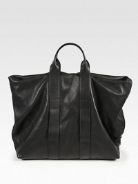They'll be plenty of hours in the day to tote around in style with this essential carryall crafted in washed cotton with leather handles.Drawstring closureTop handleInterior pocketFully linedLeather17W x 18H x 7DImported They'll be plenty of hours in the day to tote around in style with this essential carryall crafted in washed cotton with leather handles.Drawstring closureTop handleInterior pocketFully linedLeather17W x 18H x 7DImported