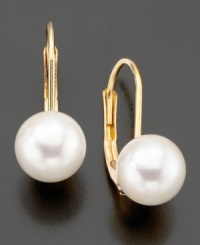 An elegant classic. These beautiful earrings feature cultured freshwater pearls (6.5-7 mm) set in 14k gold. Approximate drop: 3/4 inch. An elegant classic. These beautiful earrings feature cultured freshwater pearls (6.5-7 mm) set in 14k gold. Approximate drop: 3/4 inch.