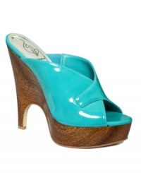 Always up for a dare. The Vanna sandals by Baby Phat are a shoe worth flaunting with their shiny patent finish and funky, retro-inspired platform wedge. Always up for a dare. The Vanna sandals by Baby Phat are a shoe worth flaunting with their shiny patent finish and funky, retro-inspired platform wedge.