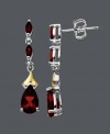 Add spark and sparkle all at once. These red-hot earrings feature pear and marquise-cut garnet (2-5/8 ct. t.w.) with a light dusting of round-cut diamond. Crafted in sterling silver with 14k gold accents. Approximate drop: 1 inch.