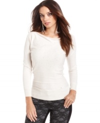 A sprinkle of sequins adds a hint of glam to this GUESS sweater -- a hot layering piece! A sprinkle of sequins adds a hint of glam to this GUESS sweater -- a hot layering piece!