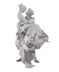Like a black-and-white photograph, this sculpture captures a marvelous moment in life: A handsome groom carrying his blushing bride over the threshold. A touchingly romantic scene by Lladró. 10.5 x 6.5. Like a black-and-white photograph, this sculpture captures a marvelous moment in life: A handsome groom carrying his blushing bride over the threshold. A touchingly romantic scene by Lladró. 10.5 x 6.5.