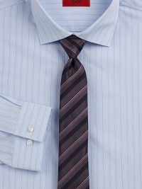 A dress classic in fine cotton, woven with berry and white pinstripes for a sharp finish. Buttonfront Spread collar Cotton Dry clean Imported A dress classic in fine cotton, woven with berry and white pinstripes for a sharp finish. Buttonfront Spread collar Cotton Dry clean Imported