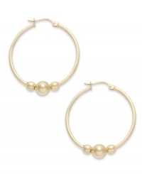 An elegant addition. Giani Bernini makes a stylish statement with its hoop earrings, featuring three beads to enhance the appeal. Set in 24k gold over sterling silver. Approximate diameter: 1-1/4 inches. An elegant addition. Giani Bernini makes a stylish statement with its hoop earrings, featuring three beads to enhance the appeal. Set in 24k gold over sterling silver. Approximate diameter: 1-1/4 inches.