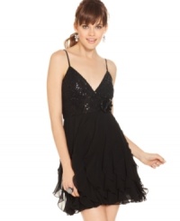 How stunning! Rows of soft ruffles balance the sequin bodice of a B. Darlin dress that's full of dark whimsy. How stunning! Rows of soft ruffles balance the sequin bodice of a B. Darlin dress that's full of dark whimsy.