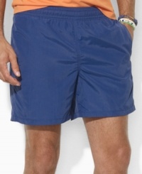 Ralph Lauren's iconic pony enriches a classic swim trunk constructed from lightweight nylon with an elasticized waist for superior comfort. Ralph Lauren's iconic pony enriches a classic swim trunk constructed from lightweight nylon with an elasticized waist for superior comfort.