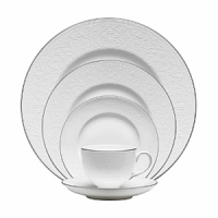 Designed to capture the classic bride, English Lace features a delicate lace motif inspired by the finest English embroidery. A shiny platinum band on each piece adds to the sophistication of this pattern, while a classic Leigh shape footed teacup adds timeless elegance. Designed to capture the classic bride, English Lace features a delicate lace motif inspired by the finest English embroidery. A shiny platinum band on each piece adds to the sophistication of this pattern, while a classic Leigh shape footed teacup adds timeless elegance.