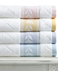 Crafted with pristine Martha Stewart Collection style, this Trousseau hand towel features a fresh white-on-white diamond pattern with embroidered leaf trim for a truly elegant appeal. Finished in pure cotton. (Clearance) Crafted with pristine Martha Stewart Collection style, this Trousseau hand towel features a fresh white-on-white diamond pattern with embroidered leaf trim for a truly elegant appeal. Finished in pure cotton. (Clearance)