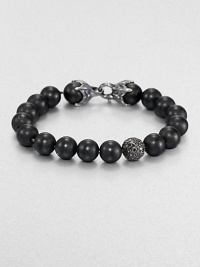 From the Spirited Bead Collection, this two-row beaded bracelet is handsomely crafted from 10mm black onyx beads, featuring a pave black diamond station and a sterling silver lobster clasp.Sterling silverBlack onyx/diamondAbout 9 longAbout 3 diam.Lobster claspImported