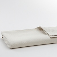 Woven matelassé coverlet paired with matching shams in a variety of colors. Woven matelassé coverlet paired with matching shams in a variety of colors.