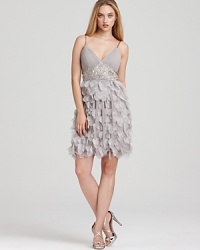 Sue Wong's cocktail dress is in full bloom for the season. Triangle top styling with beaded midriff and full petal skirt. Wear the petals with the metal t-straps. Sue Wong's cocktail dress is in full bloom for the season. Triangle top styling with beaded midriff and full petal skirt. Wear the petals with the metal t-straps.