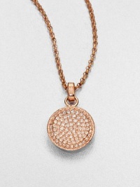 From the Brilliance Collection. A pretty pavé pendant has a slight concave shape that enhances the sparkle of its light-catching glass stones as it hangs from a graceful rose-finished chain.GlassRose goldtoneChain length, about 16Pendant diameter, about .5Clasp closeImported From the Brilliance Collection. A pretty pavé pendant has a slight concave shape that enhances the sparkle of its light-catching glass stones as it hangs from a graceful rose-finished chain.GlassRose goldtoneChain length, about 16Pendant diameter, about .5Clasp closeImported