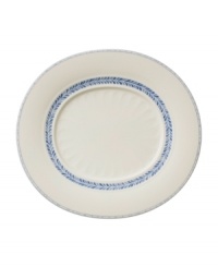 Vintage charm meets modern durability in the Farmhouse Touch oval gourmet plate, featuring cornflower-blue laurels and bands in delicately embossed porcelain from Villeroy & Boch. Vintage charm meets modern durability in the Farmhouse Touch oval gourmet plate, featuring cornflower-blue laurels and bands in delicately embossed porcelain from Villeroy & Boch.