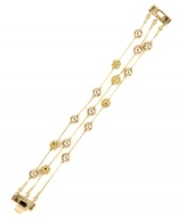Strand together your perfect look with AK Anne Klein's flaunt-worthy flex bracelet. Crafted in gold-tone mixed metal, it's adorned with topaz-hued glass pearls and gold-tone crystal pave ball accents. Approximate length: 7-1/2 inches. Strand together your perfect look with AK Anne Klein's flaunt-worthy flex bracelet. Crafted in gold-tone mixed metal, it's adorned with topaz-hued glass pearls and gold-tone crystal pave ball accents. Approximate length: 7-1/2 inches.