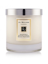 Instantly awakening the senses, Grapefruit is a lively, uplifting citrus with a spicy heart. Grapefruit and tangerine are combined with vetyver and rosemary to create this outspoken citrus scent. The Grapefruit Home Candle infuses any room with evocative scent and lasts for hours. An everyday luxury, it brings warmth to any environment. Burn time is approximately 45 hours. Lid included. Instantly awakening the senses, Grapefruit is a lively, uplifting citrus with a spicy heart. Grapefruit and tangerine are combined with vetyver and rosemary to create this outspoken citrus scent. The Grapefruit Home Candle infuses any room with evocative scent and lasts for hours. An everyday luxury, it brings warmth to any environment. Burn time is approximately 45 hours. Lid included.