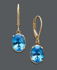 Amp up the intensity with bright blue hues. Earrings feature oval-cut blue topaz (4-1/3 ct. t.w.) set in 14k gold. Approximate drop: 1 inch. Amp up the intensity with bright blue hues. Earrings feature oval-cut blue topaz (4-1/3 ct. t.w.) set in 14k gold. Approximate drop: 1 inch.