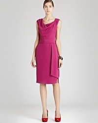 Elevate your office style with this REISS dress, featuring a sophisticated cowl neck and elegant side drape for a look that's modernly chic. Elevate your office style with this REISS dress, featuring a sophisticated cowl neck and elegant side drape for a look that's modernly chic.